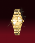 A gold-tone quartz wristwatch with a matching gold-tone link bracelet, featuring a white dial with diamond hour markers and a date window at 3 o'clock, set against a dark red gradient background with a faint horse logo.